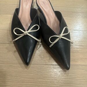Anthropologie Black Pointed Slip-On Mules with Cream Bow Accent